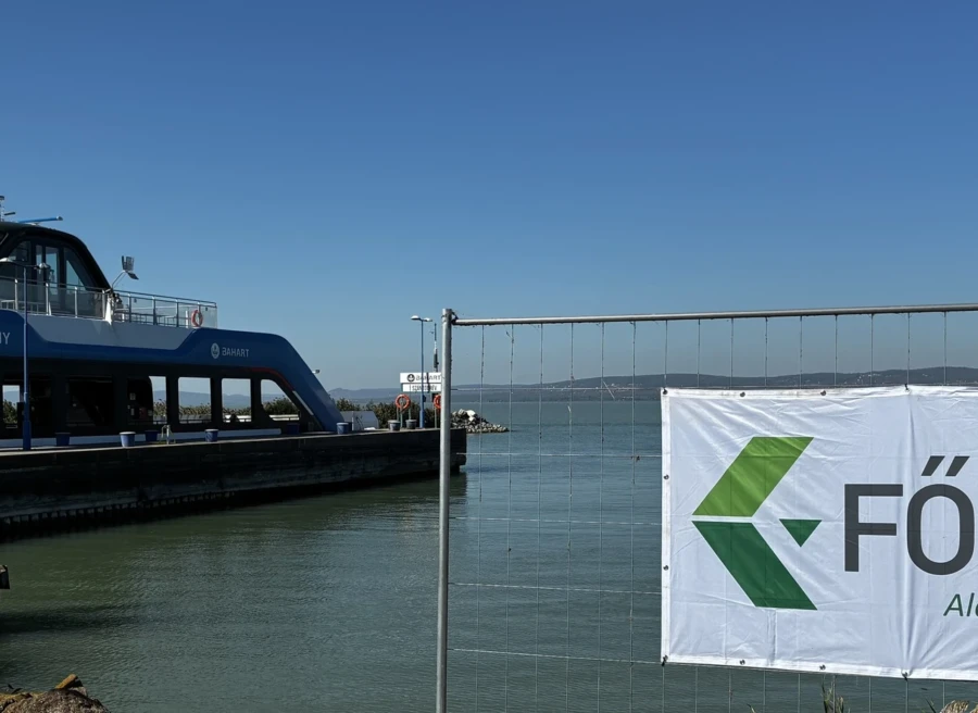The Tihany ferry and the FŐBER banner at the Szántód ferry port